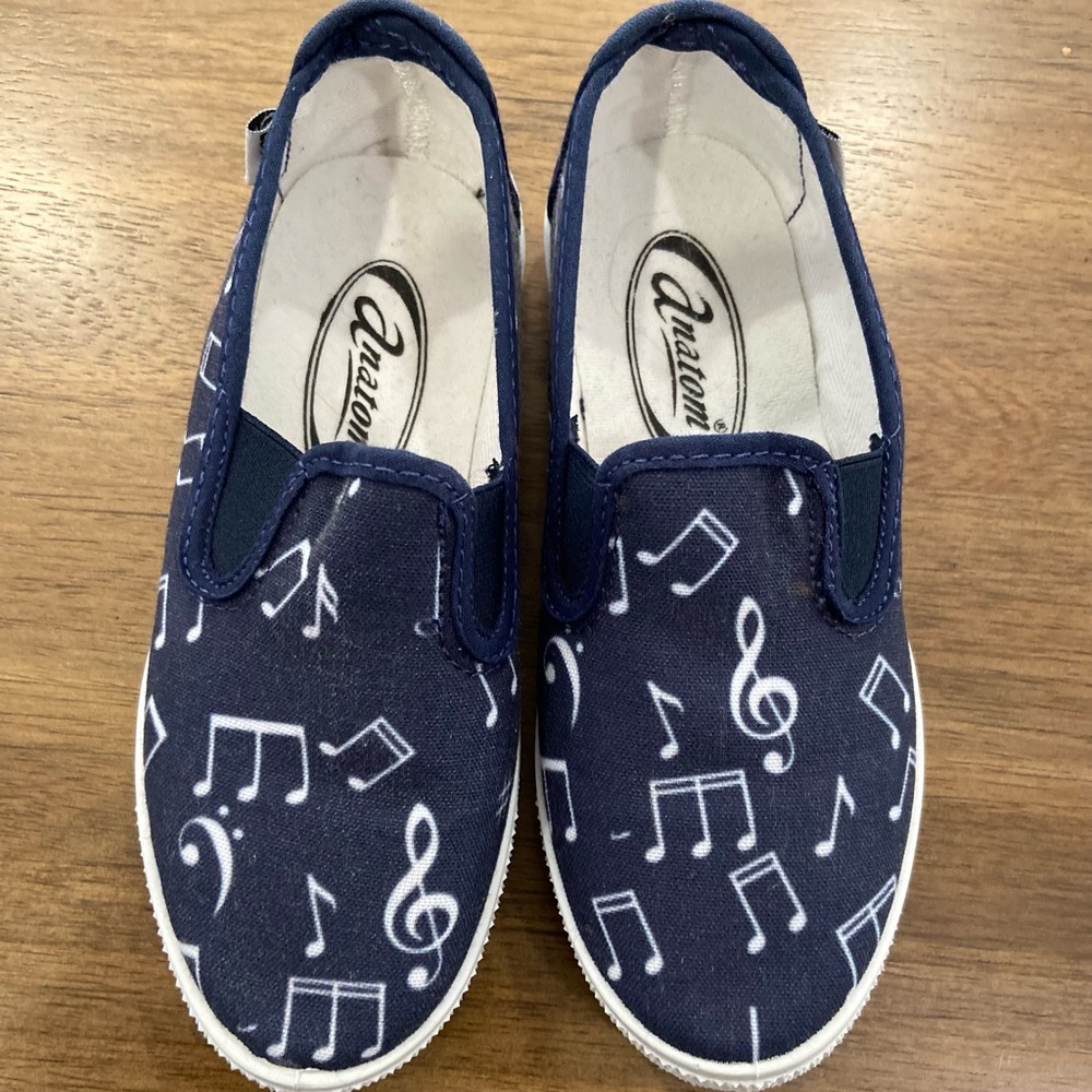 Blue sneakers with music notes